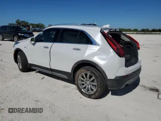 2020 Cadillac XT4 FWD Premium Luxury z VIN 1GYFZCR48LF128683, wystawiony jako Copart lot #82842694 z przebiegiem Nie podano mil oraz Szkoda całkowita • Salvage title. Historia ofert i sprzedaży dostępna na DreamBid. Obrazek 2.