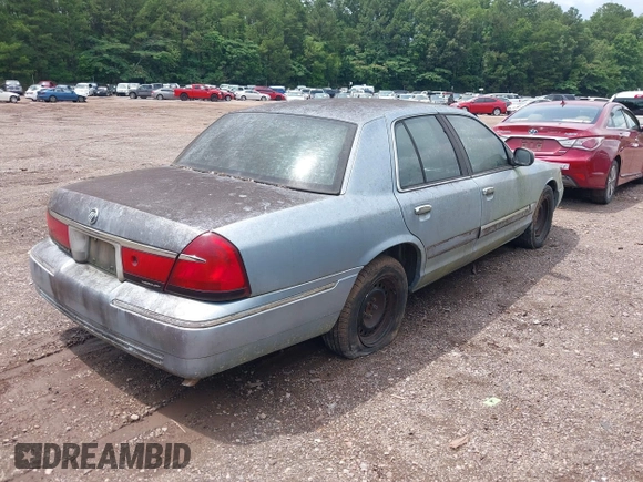 1999 Mercury Grand Marquis GS z VIN 2MEFM74W8XX686921, wystawiony jako IAAI lot #42374777 z przebiegiem 185 166 mil mil oraz . Historia ofert i sprzedaży dostępna na DreamBid. Obrazek 4.