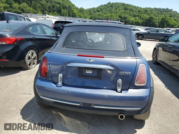 2005 MINI Convertible z VIN WMWRF33435TF60350, wystawiony jako Copart lot #50545005 z przebiegiem 91 078 mil mil oraz Szkoda całkowita • Salvage title. Historia ofert i sprzedaży dostępna na DreamBid. Obrazek 6.