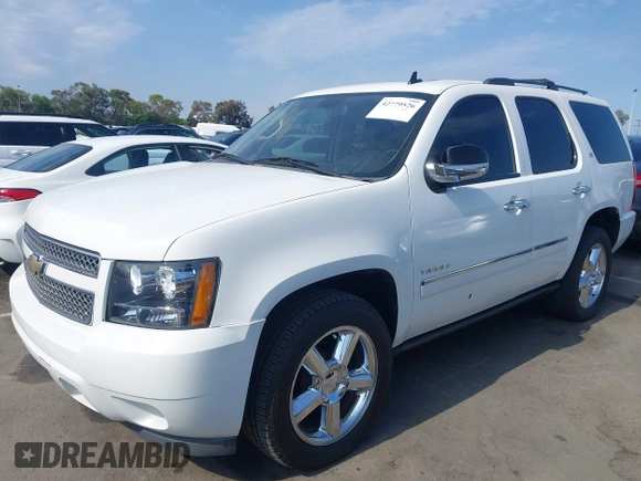 2013 Chevrolet Tahoe LTZ with VIN 1GNSKCE04DR374682, listed as a IAAI auction lot 42779526 with 139,533 mi miles and . Bid and sale history available at DreamBid. Image 17.