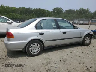 1997 Honda Civic LX z VIN 2HGEJ6677VH573069, wystawiony jako Copart lot #59739065 z przebiegiem 287 987 mil mil oraz Szkoda całkowita • Salvage title. Historia ofert i sprzedaży dostępna na DreamBid. Obrazek 3.