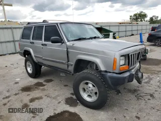 2001 Jeep Cherokee Sport with VIN 1J4FF48S91L592966, listed as a Copart auction lot 58996445 with 159,140 mi miles and Salvage title. Bid and sale history available at DreamBid. Image 4.