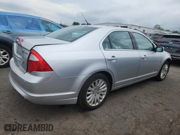 2012 Ford Fusion Hybrid z VIN 3FADP0L34CR227740, wystawiony jako Copart lot #64989475 z przebiegiem 134 862 mil mil oraz Szkoda całkowita • Salvage title. Historia ofert i sprzedaży dostępna na DreamBid. Obrazek 3.