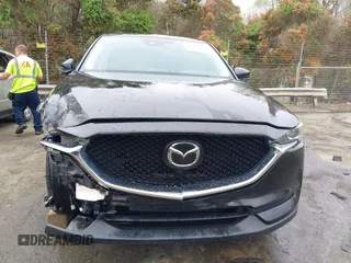 2020 Mazda CX-5 Touring with VIN JM3KFACM9L0770933, listed as a IAAI auction lot 41921464 with 75,997 mi miles. Bid and sale history available at carsss.com. Image 12.