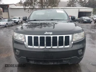 2011 Jeep Grand Cherokee Laredo z VIN 1J4RR4GG1BC566381, wystawiony jako IAAI lot #41547199 z przebiegiem 215 157 mil mil oraz . Historia ofert i sprzedaży dostępna na DreamBid. Obrazek 12.