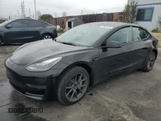 2023 Tesla Model 3 with VIN 5YJ3E1EA1PF677592, listed as a Copart auction lot 47621875 with 12,247 mi miles and Salvage Title. Bid and sale history available at DreamBid. Image 1.