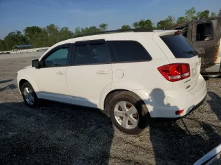 2012 Dodge Journey SXT z VIN 3C4PDCBGXCT153166, wystawiony jako Copart lot #53843265 z przebiegiem 177 289 mil mil oraz Szkoda całkowita • Salvage title. Historia ofert i sprzedaży dostępna na DreamBid. Obrazek 2.