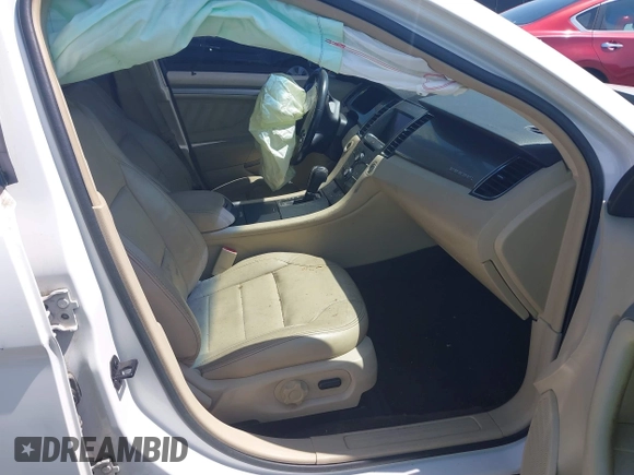 2014 Ford Taurus SEL with VIN 1FAHP2E86EG132676, listed as a IAAI auction lot 41943392 with 183,633 mi miles. Bid and sale history available at carsss.com. Image 5.