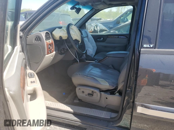 2003 GMC Envoy SLE with VIN 1GKDS13S732203933, listed as a Copart auction lot 72735604 with 0 mi miles and Clean Title. Bid and sale history available at carsss.com. Image 7.