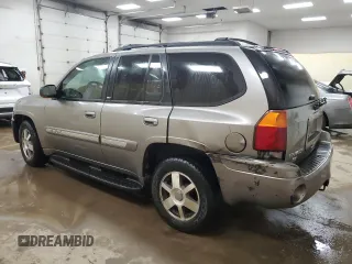 2005 GMC Envoy SLE with VIN 1GKDS13S952383743, listed as a Copart auction lot 43797315 with 185,833 mi miles and Salvage title. Bid and sale history available at DreamBid. Image 2.