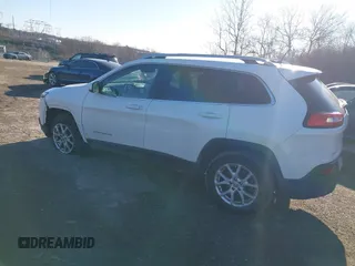 2015 Jeep Cherokee Latitude with VIN 1C4PJMCB3FW734573, listed as a IAAI auction lot 41825561 with 141,250 mi miles. Bid and sale history available at carsss.com. Image 3.
