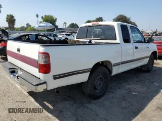 1997 Toyota T100 DX z VIN JT4TN12D0V0038324, wystawiony jako Copart lot #72609844 z przebiegiem 233 254 mil mil oraz Tytuł czysty. Historia ofert i sprzedaży dostępna na DreamBid. Obrazek 3.