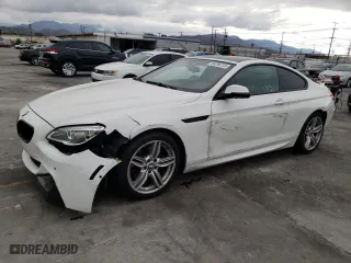 2016 BMW 6 Series 650i xDrive with VIN WBA6H7C5XGGA05131, listed as a Copart auction lot 68296733 with 31,100 mi miles. Bid and sale history available at carsss.com. Image 1.