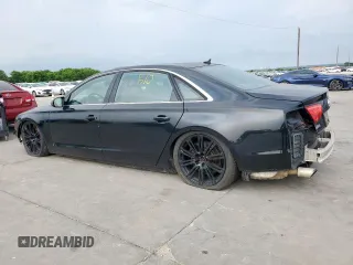 2011 Audi A8 z VIN WAURVAFD2BN005986, wystawiony jako Copart lot #57610145 z przebiegiem Nie podano mil oraz Tytuł czysty. Historia ofert i sprzedaży dostępna na DreamBid. Obrazek 2.