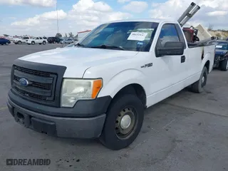 2014 Ford F-150 XL with VIN 1FTMF1CM6EKD40608, listed as a IAAI auction lot 40650148 with 163,333 mi miles. Bid and sale history available at carsss.com. Image 2.