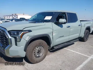 2022 Toyota Tundra Limited Hybrid with VIN 5TFJC5EC9NX001528, listed as a IAAI auction lot 41625774 with 57,475 mi miles and . Bid and sale history available at DreamBid. Image 2.