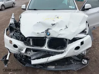 2016 BMW X5 xDrive35i with VIN 5UXKR0C57G0P24296, listed as a IAAI auction lot 41815189 with 116,084 mi miles. Bid and sale history available at carsss.com. Image 6.