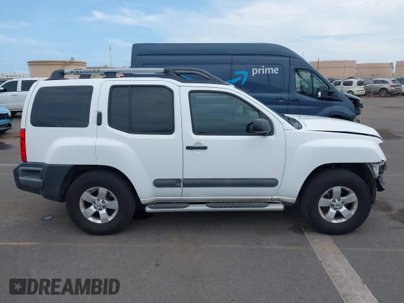 2012 Nissan Xterra X with VIN 5N1AN0NU5CC517567, listed as a IAAI auction lot 41950479 with 162,371 mi miles and . Bid and sale history available at DreamBid. Image 14.