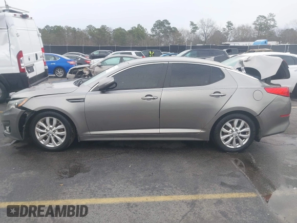 2014 Kia Optima EX z VIN 5XXGN4A75EG290132, wystawiony jako IAAI lot #41292706 z przebiegiem 155 793 mil mil oraz . Historia ofert i sprzedaży dostępna na DreamBid. Obrazek 14.