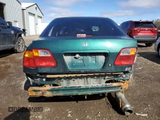 1999 Honda Civic z VIN 2HGEJ6685XH916327, wystawiony jako Copart lot #49142465 z przebiegiem 149 067 mil mil oraz Czysty tytuł • Clean title. Historia ofert i sprzedaży dostępna na DreamBid. Obrazek 6.