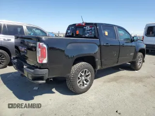 2021 GMC Canyon 4WD AT4 w/Cloth with VIN 1GTG6FEN4M1268263, listed as a Copart auction lot 72393764 with 42,249 mi miles and Salvage Title. Bid and sale history available at carsss.com. Image 3.