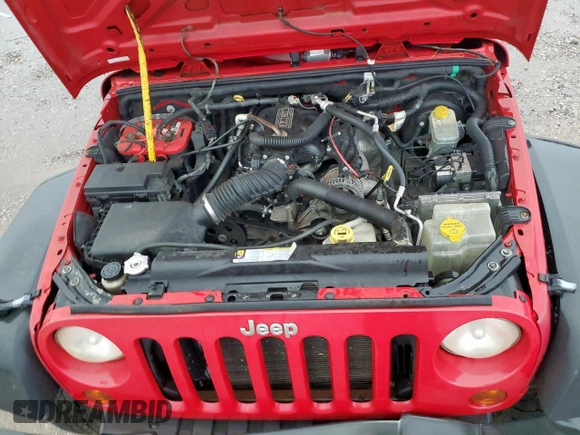 2008 Jeep Wrangler X z VIN 1J4FA24188L650933, wystawiony jako Copart lot #60603225 z przebiegiem 121 682 mil mil oraz Szkoda całkowita • Salvage title. Historia ofert i sprzedaży dostępna na DreamBid. Obrazek 11.