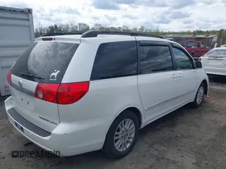 2009 Toyota Sienna XLE with VIN 5TDZK22C79S259793, listed as a IAAI auction lot 41905617 with 185,121 mi miles and . Bid and sale history available at DreamBid. Image 4.