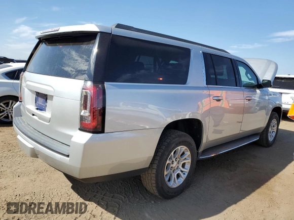 2016 GMC Yukon XL SLE with VIN 1GKS2FKC4GR285826, listed as a Copart auction lot 69486214 with 58,879 mi miles and Clean Title. Bid and sale history available at DreamBid. Image 3.