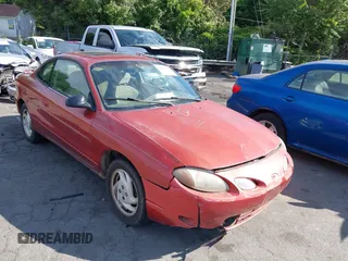 1999 Ford Escort Cool z VIN 3FAKP1130XR106046, wystawiony jako IAAI lot #42150870 z przebiegiem 284 643 mil mil oraz . Historia ofert i sprzedaży dostępna na DreamBid. Obrazek 1.