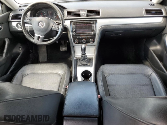 2013 Volkswagen Passat SE with VIN 1VWBP7A35DC087692, listed as a Copart auction lot 62236985 with 195,921 mi miles and Salvage title. Bid and sale history available at DreamBid. Image 8.