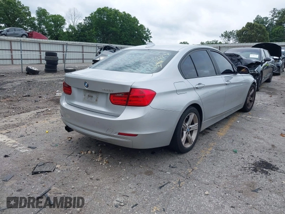 2012 BMW 3 Series 328i with VIN WBA3A5C50CF349365, listed as a IAAI auction lot 42379944 with 193,548 mi miles and . Bid and sale history available at DreamBid. Image 4.