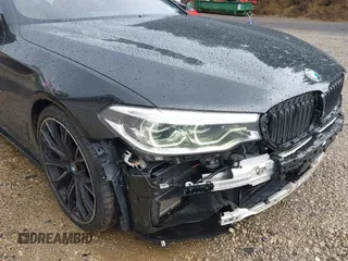 2018 BMW 5 Series M550i xDrive with VIN WBAJB9C5XJB286923, listed as a IAAI auction lot 42527301 with 76,923 mi miles and . Bid and sale history available at DreamBid. Image 19.