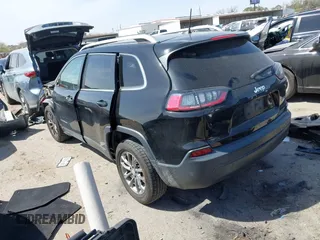 2019 Jeep Cherokee Latitude Plus with VIN 1C4PJLLB0KD358852, listed as a IAAI auction lot 41794999 with 112,667 mi miles. Bid and sale history available at carsss.com. Image 3.