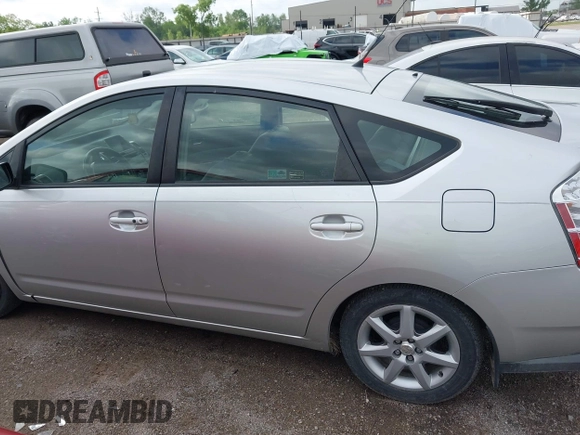 2007 Toyota Prius z VIN JTDKB20U873273942, wystawiony jako IAAI lot #42113046 z przebiegiem 126 635 mil mil oraz . Historia ofert i sprzedaży dostępna na DreamBid. Obrazek 15.
