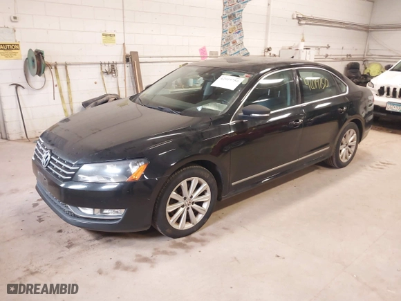 2013 Volkswagen Passat SEL Premium with VIN 1VWCP7A37DC068954, listed as a IAAI auction lot 42019750 with 127,943 mi miles. Bid and sale history available at carsss.com. Image 2.