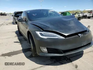 2020 Tesla Model S Long Range с VIN 5YJSA1E28LF400562, выставлен на аукционе Copart как лот 53576125 с пробегом 73 808 миль миль и Списание • Salvage title. История ставок и продаж доступна на DreamBid. Изображение 13.