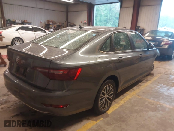 2021 Volkswagen Jetta S with VIN 3VWC57BU6MM087586, listed as a IAAI auction lot 42181804 with 61,931 mi miles and . Bid and sale history available at DreamBid. Image 4.