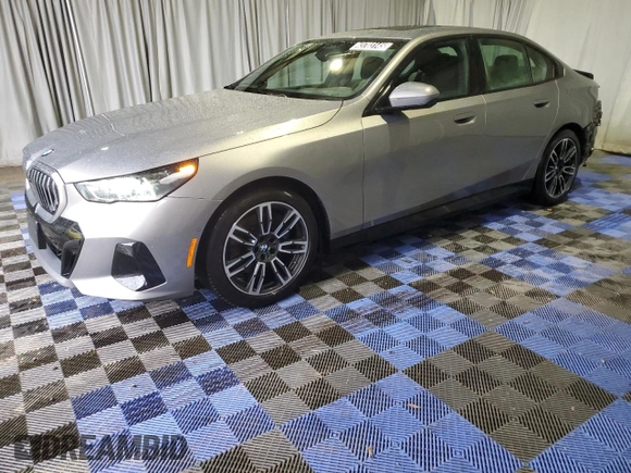 2024 BMW 5 Series 530i with VIN WBA43FJ0XRCS74003, listed as a Copart auction lot 43703145 with 7,942 mi miles and Clean Title. Bid and sale history available at carsss.com. Image 1.