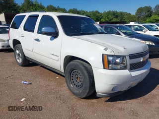 2007 Chevrolet Tahoe LT z VIN 1GNFC13J67J378198, wystawiony jako IAAI lot #42157204 z przebiegiem 383 232 mil mil oraz . Historia ofert i sprzedaży dostępna na DreamBid. Obrazek 1.