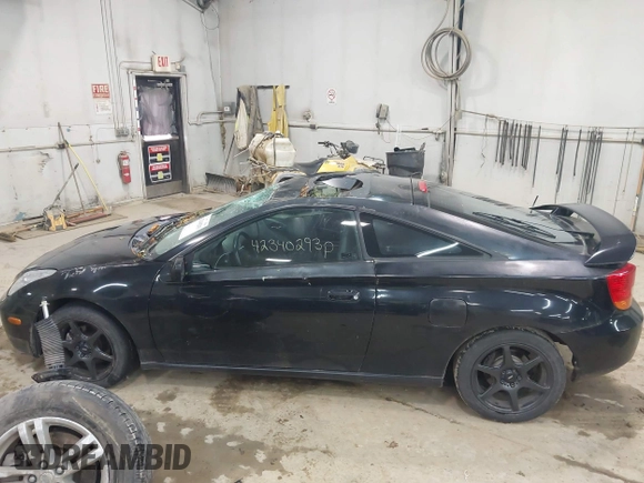 2000 Toyota Celica GTS z VIN JTDDY32T1Y0003665, wystawiony jako IAAI lot #42340293 z przebiegiem 206 239 mil mil oraz . Historia ofert i sprzedaży dostępna na DreamBid. Obrazek 14.