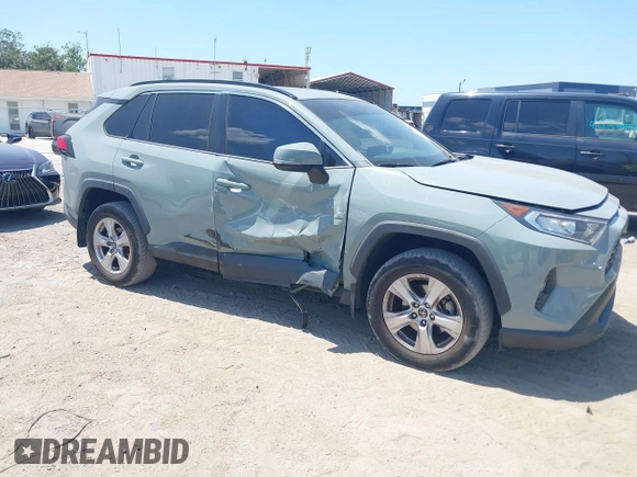 2020 Toyota RAV4 XLE with VIN 2T3W1RFV0LW069849, listed as a IAAI auction lot 42138074 with 112,062 mi miles and . Bid and sale history available at DreamBid. Image 1.