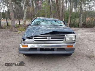 1995 Toyota T100 z VIN JT4VD11E8S0006805, wystawiony jako IAAI lot #41867368 z przebiegiem 261 130 mil mil oraz . Historia ofert i sprzedaży dostępna na DreamBid. Obrazek 13.