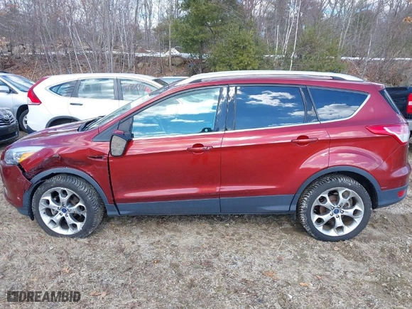 2016 Ford Escape Titanium with VIN 1FMCU9J9XGUC71696, listed as a IAAI auction lot 41651168 with 108,856 mi miles. Bid and sale history available at carsss.com. Image 14.