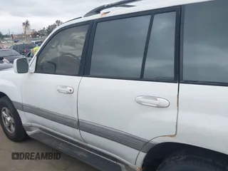 2001 Toyota Land Cruiser z VIN JTEHT05J412004663, wystawiony jako IAAI lot #42192078 z przebiegiem 358 917 mil mil oraz . Historia ofert i sprzedaży dostępna na DreamBid. Obrazek 14.