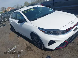 2023 Kia Forte GT-Line with VIN 3KPF54AD5PE563311, listed as a IAAI auction lot 42028015 with 54,900 mi miles. Bid and sale history available at carsss.com. Image 1.