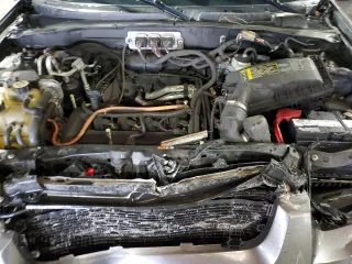 2006 Ford Escape Hybrid with VIN 1FMCU95H76KB36333, listed as a Copart auction lot 55693945 with 147,470 mi miles and Non repairable. Bid and sale history available at DreamBid. Image 12.