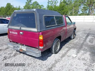 1995 Nissan Frontier with VIN 1N6SD11S3SC327624, listed as a IAAI auction lot 42635114 with 353,265 mi miles and . Bid and sale history available at DreamBid. Image 4.