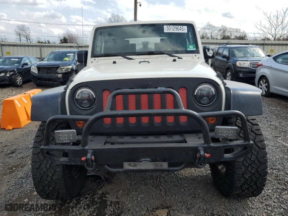 2010 Jeep Wrangler Mountain with VIN 1J4AA2D17AL145255, listed as a Copart auction lot 50129645 with 82,003 mi miles and Clean Title. Bid and sale history available at carsss.com. Image 5.