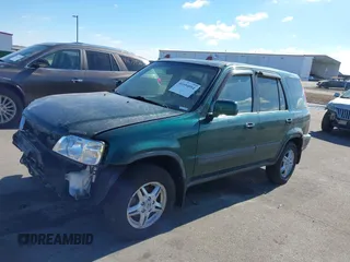 2000 Honda CR-V EX with VIN JHLRD176XYC035377, listed as a IAAI auction lot 41694054 with 196,985 mi miles. Bid and sale history available at carsss.com. Image 19.