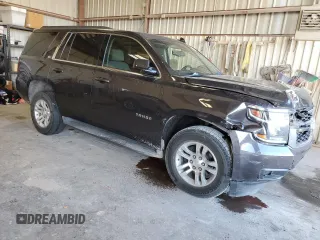 2015 Chevrolet Tahoe LS with VIN 1GNSCAKC5FR501801, listed as a Copart auction lot 50850645 with 112,896 mi miles and Salvage title. Bid and sale history available at DreamBid. Image 4.